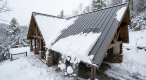 Standing seam metal roof shedding snow in the North Carolina High Country