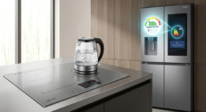A sleek modern kitchen featuring a rapidly boiling induction cooktop and a smart refrigerator displaying energy efficiency data. Essential home appliances.